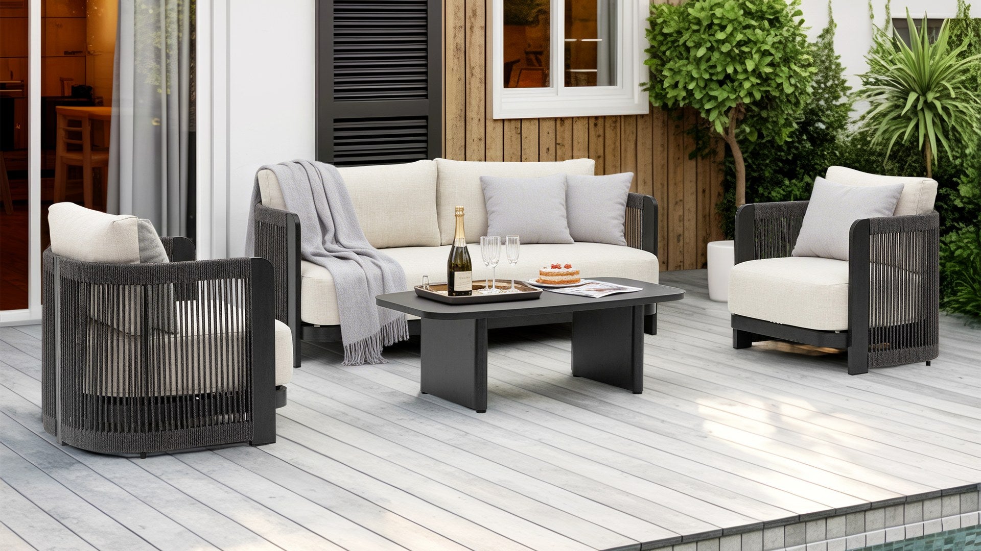 HAVANA Black Wood lounge set on a wooden deck