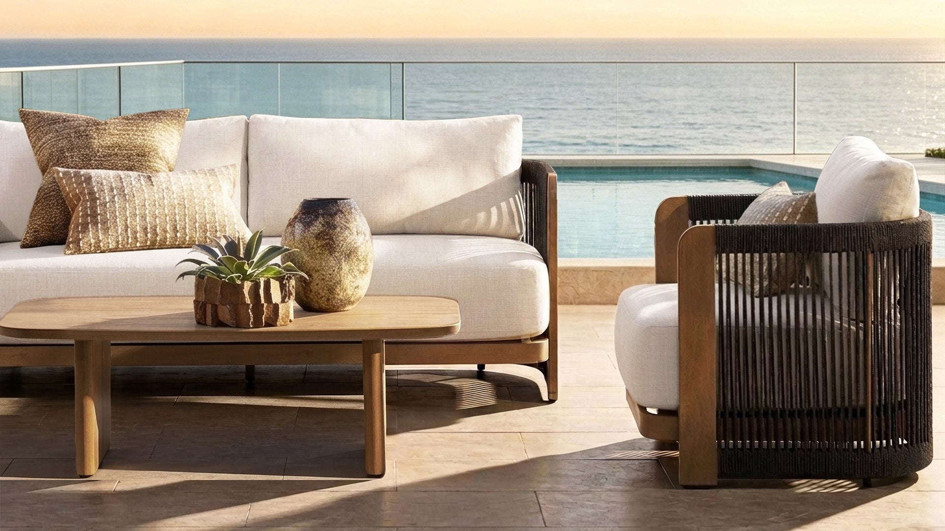 HAVANA Natural Wood sofa and armchair by an oceanfront pool